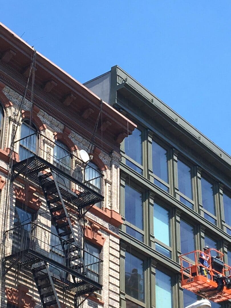 A fire escape on the side of an old building.