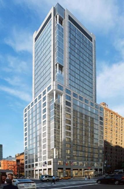 A tall building with many glass windows