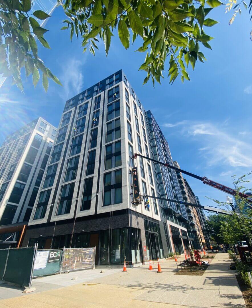 A building that is under construction with trees